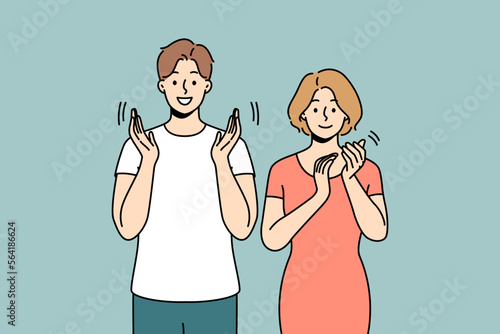 Smiling people clap hands meet welcome someone. Happy man and woman applaud show appreciation and acknowledgement. Vector illustration. 