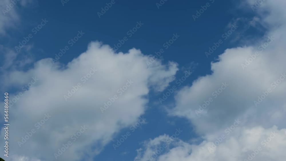 Timelapse white cumulus cloud in Blue sky, Puffy fluffy white clouds Nature weather blue sky.