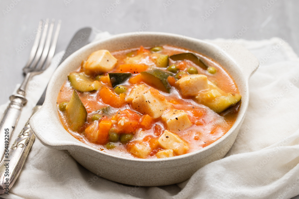 Delicious stew squid with vegetables in bowl Delicious stew squid with vegetables in bowl