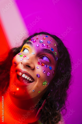 Creative studio portrait of beautiful hispanic woman with diastema - Cool  modern and unique female adult posing on colorful background  concepts about diversity  individuality and fashion