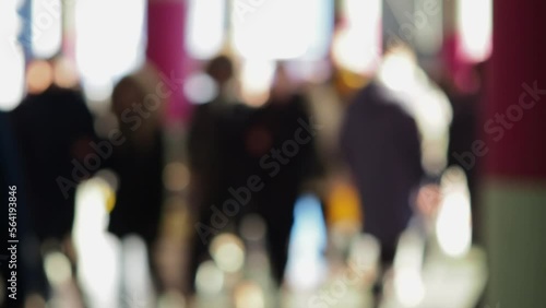 Blurred Crowd Walking in Urban Setting