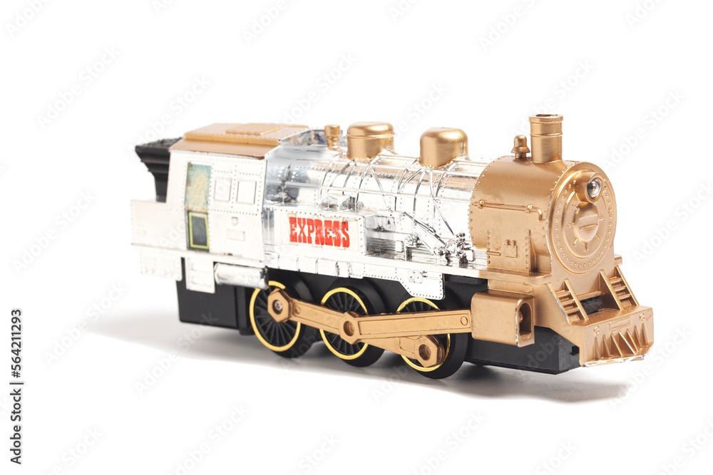toy train with freight car trolley on railway tracks, isolated on white background, children's railway with steam locomotives, battery powered train. toy train with freight car trolley on railway tracks, isolated on white background, children's railway with steam locomotives, battery powered train.