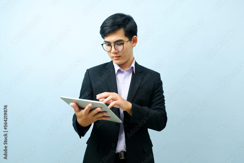 Portrait of businessman using tablet. Portrait of businessman using tablet.