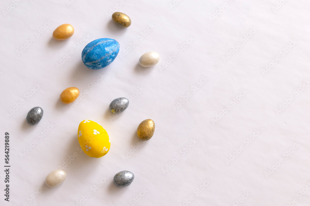 Happy Easter. Beautiful colorful egg with different pattern on grey background. Spring holiday. Happy Easter. Beautiful colorful egg with different pattern on grey background. Spring holiday.