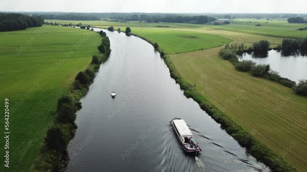 Boat sailing through a channel drone Boat sailing through a channel drone