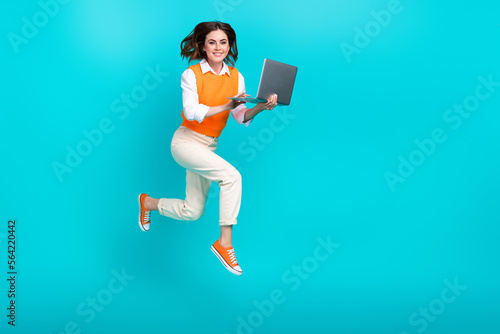 Full body size photo cadre of teacher lady remote educaion promoter hold netbook video call with students isolated on aquamarine color background