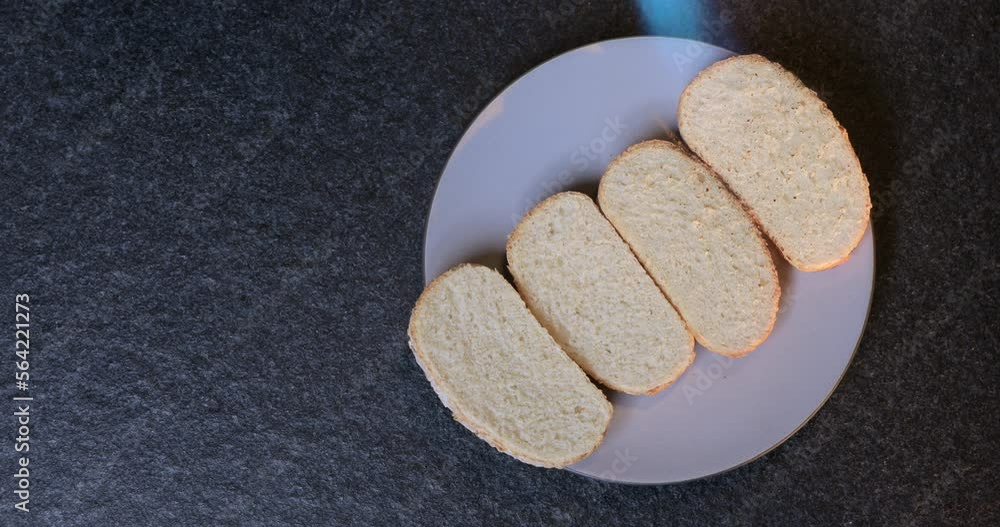 Burning toast on a plate. Roast white bread. Whole grain bread is