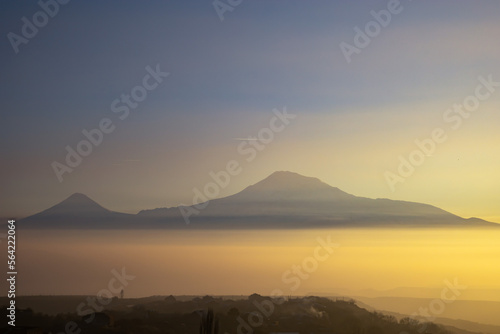 Mount Ararat at dramatic sunset on a foggy winter day