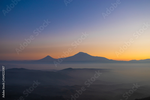 Mount Ararat at dramatic sunset on a foggy winter day