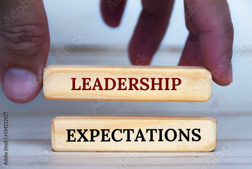 Wallpaper Mural Hand holding leadership expectation text on wooden blocks. Leadership expectation and business concept. Torontodigital.ca