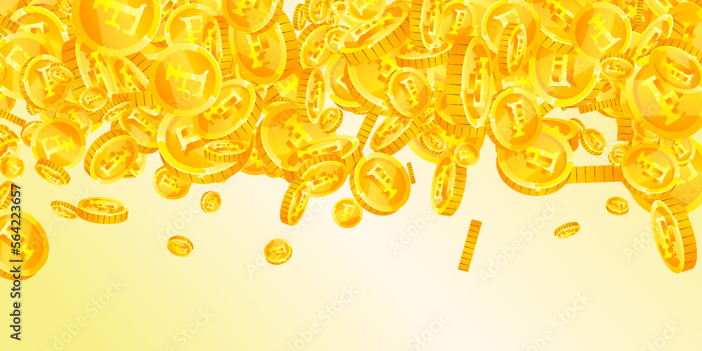 Obraz premium Swiss franc coins falling. Gold scattered CHF