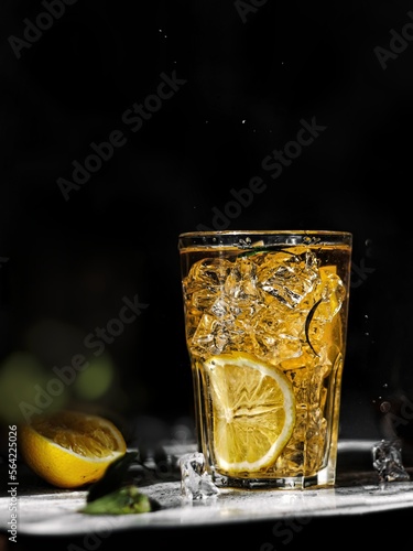 glass of could ice tea with lemon 