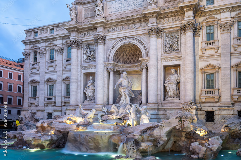 Amazing panoramic view with no people of famous  Rome Trevi Fountain (Fontana di Trevi) in blue hour before sunrise, Rome, Italy.