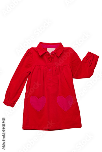 Summer dress isolated. A beautiful red girl's dress with attached heart shaped pockets and long sleeves isolated on white. Clipping path. Kids spring and autumn fashion.