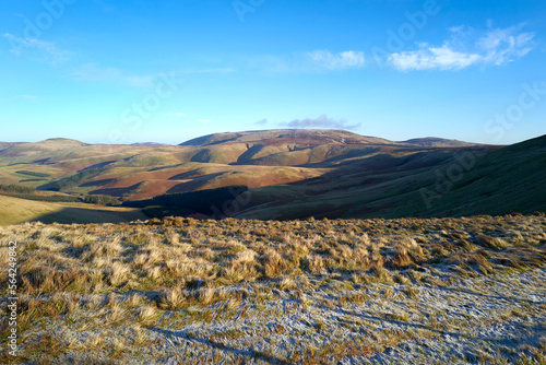 Obraz na płótnie Views of The Cheviot from Windy Rig on a sunny but frosty winters morning in the Northumberland Cheviot mountains at sunrise, UK. w salonie