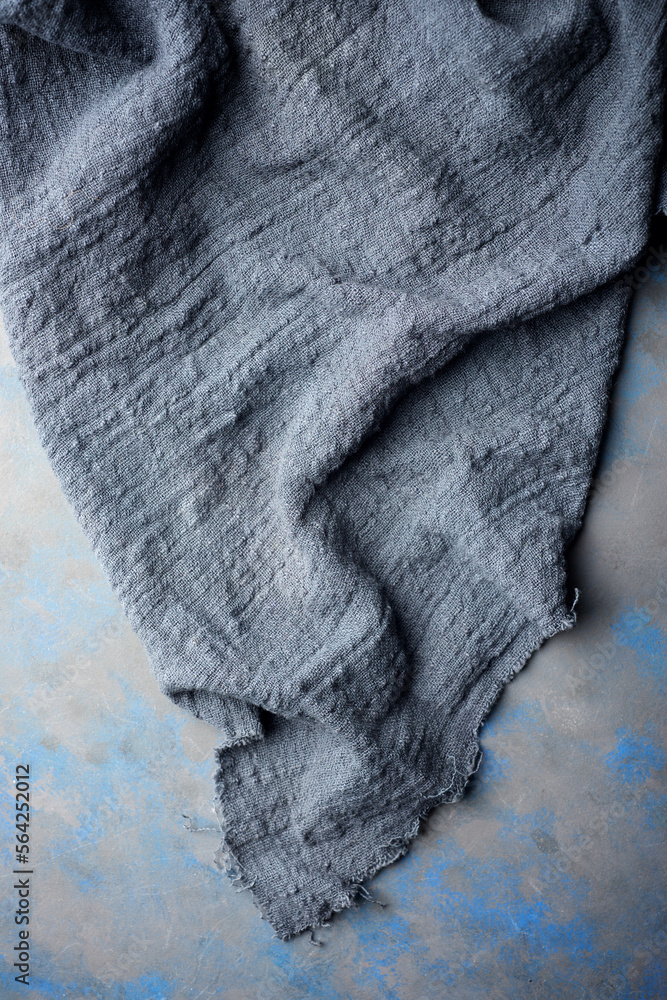 Fototapeta premium Blue kitchen towel on a table