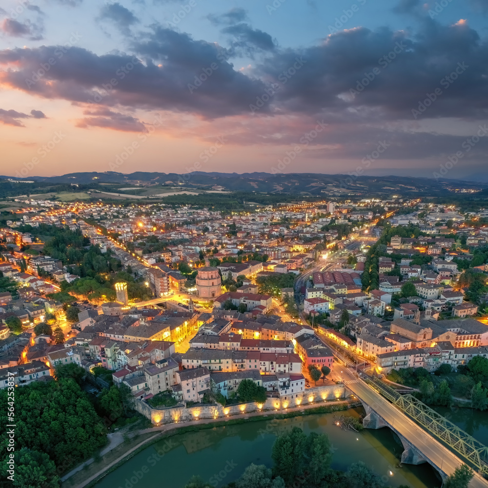 Fototapeta premium Old italian city Umbertide near Tevere river with cloudy sunset light. Aerial view from above