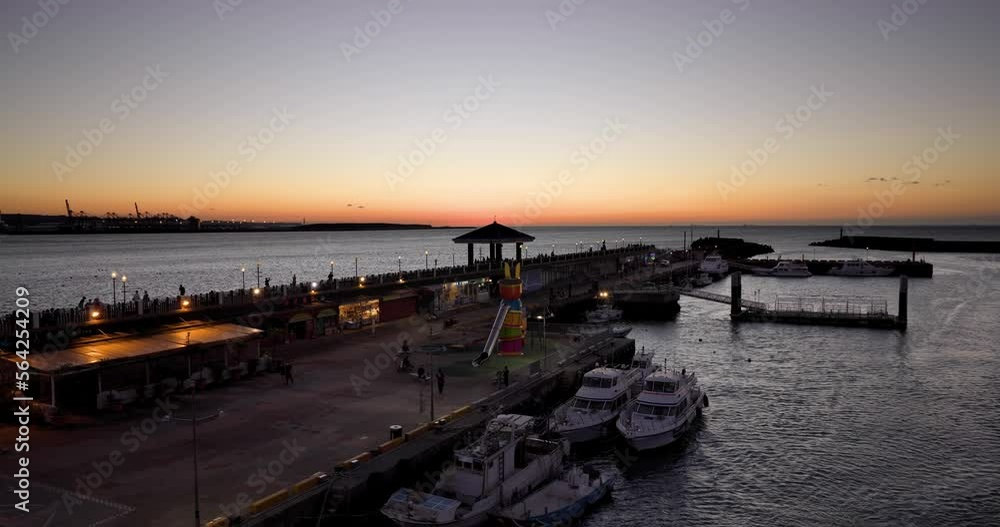 Walk though Tamsui Fisherman Wharf in Taiwan with beautiful sunset Walk though Tamsui Fisherman Wharf in Taiwan with beautiful sunset