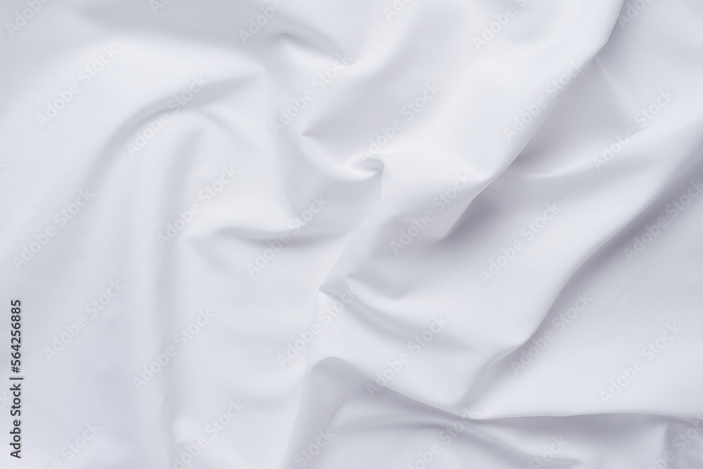 White fabric. luxurious white fabric texture background. Creases of satin, silk and cotton.	