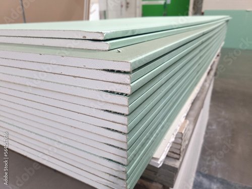 Valokuva water resistant plasterboard sheets stacked in a hardware store