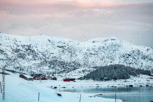 Sunny winter day in norwegian mountains and epic view, Norway. Amazing landscape in Lofoten. Lovely clouds and blue sky.