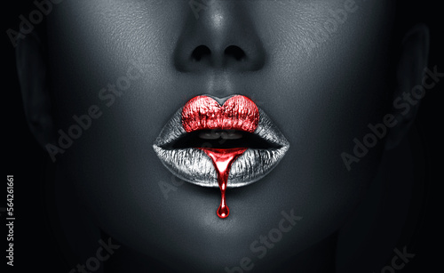 Red heart Paint dripping, lipgloss drops on sexy lips, bright liquid paint on beautiful model girl's mouth, Valentine's Day art design. Lipstick. Make-up. Beauty face, close up. On dark background © Subbotina Anna