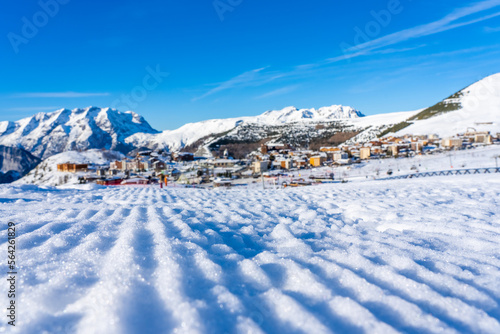 Famous ski resort in French Alps, France, Europe. Skiers skiing on the mountain, ski lift, family sports weekend, holidays in the snow mountains concept. Winter times