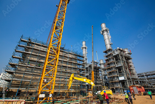 New construction Gas turbine electrical power plant crane during the current distribution