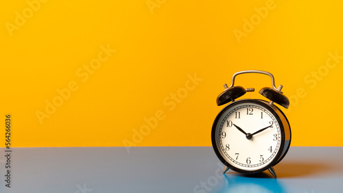 Classic black clock old vintage alarm, Retro alarm clock on table , background with copy space, Retro alarm morning