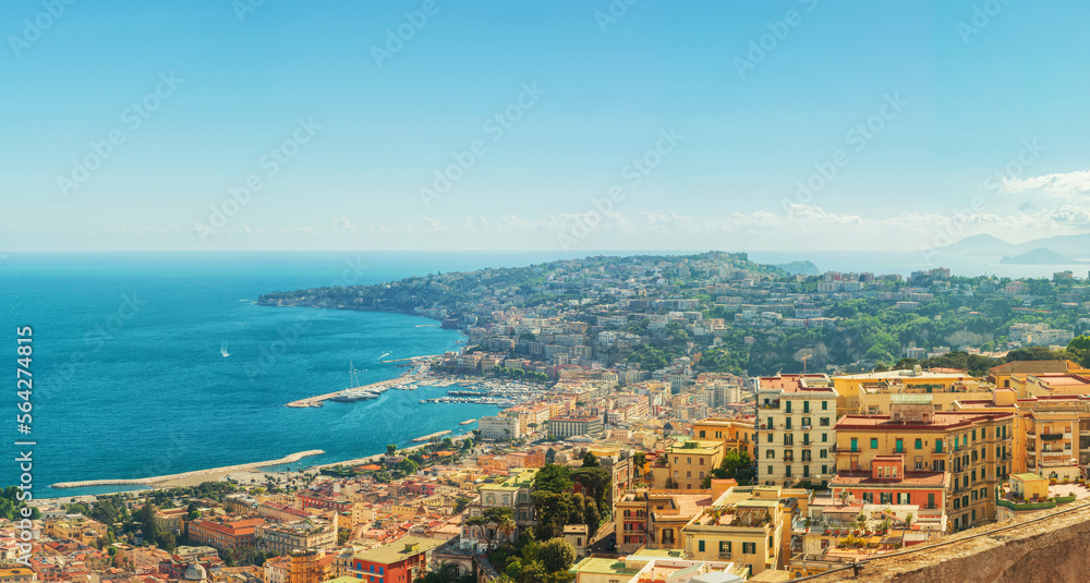 Aerial panoramic view of Naples city on the coast of Mediterranean sea, Campania, Italy. Cityscape of Napoli.