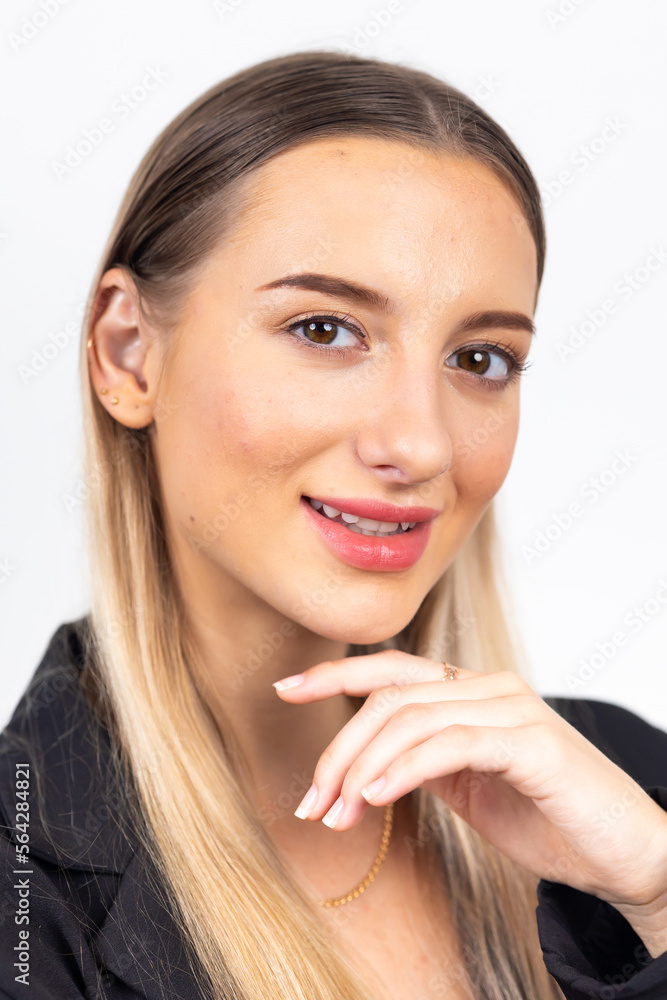 Happy young caucasian female looking at camera. Professional company business woman over white wall background Happy young caucasian female looking at camera. Professional company business woman over white wall background