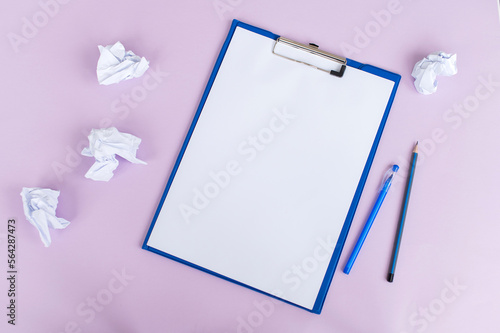 A blue stationery set as a template with a place to copy on a light background. Crumpled paper
