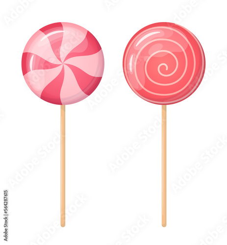 Red and pink tasty candy on sticks.