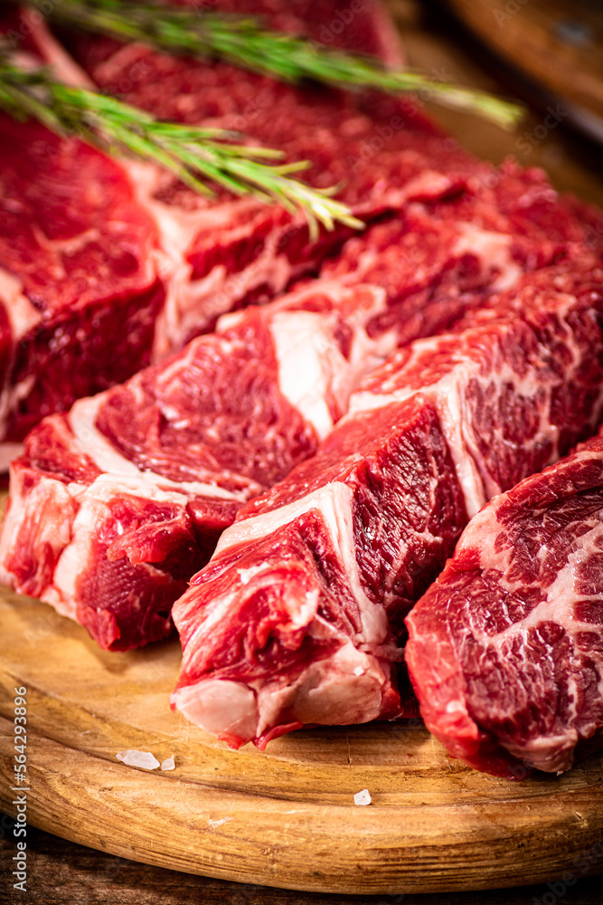 Chopped raw beef on a cutting board. 