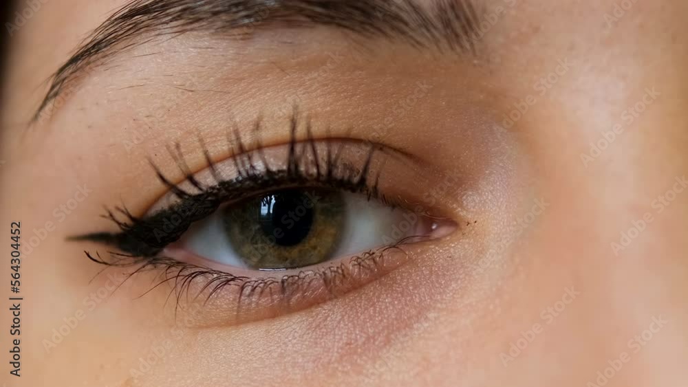 Macro view of young woman eye closeup details, blinking eyes slowmotion 4k Macro view of young woman eye closeup details, blinking eyes slowmotion 4k
