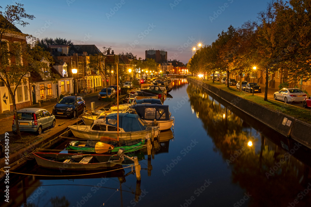 Medieval houses in the historical town Sneek in the Netherlands at night