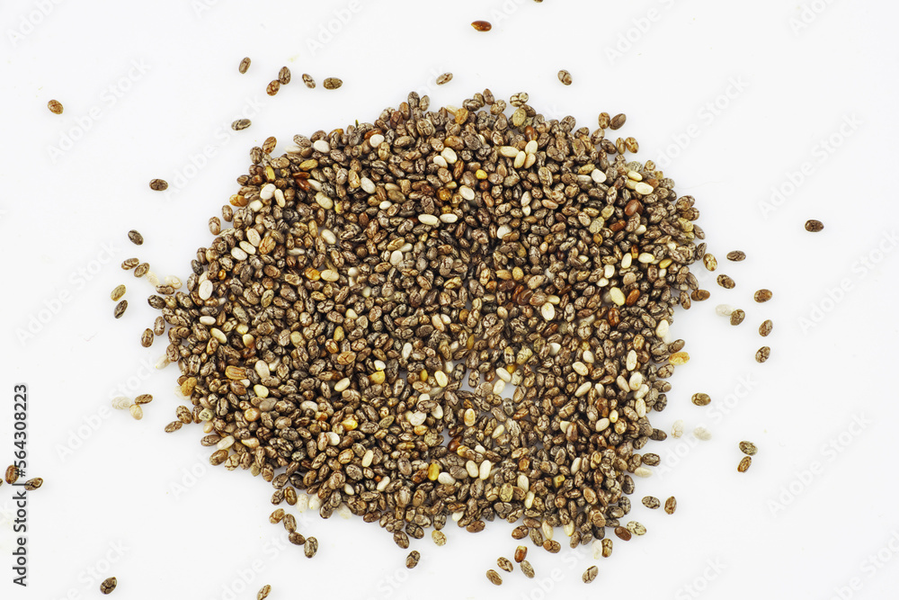 macro chia seeds lying in a group on a white background macro chia seeds lying in a group on a white background