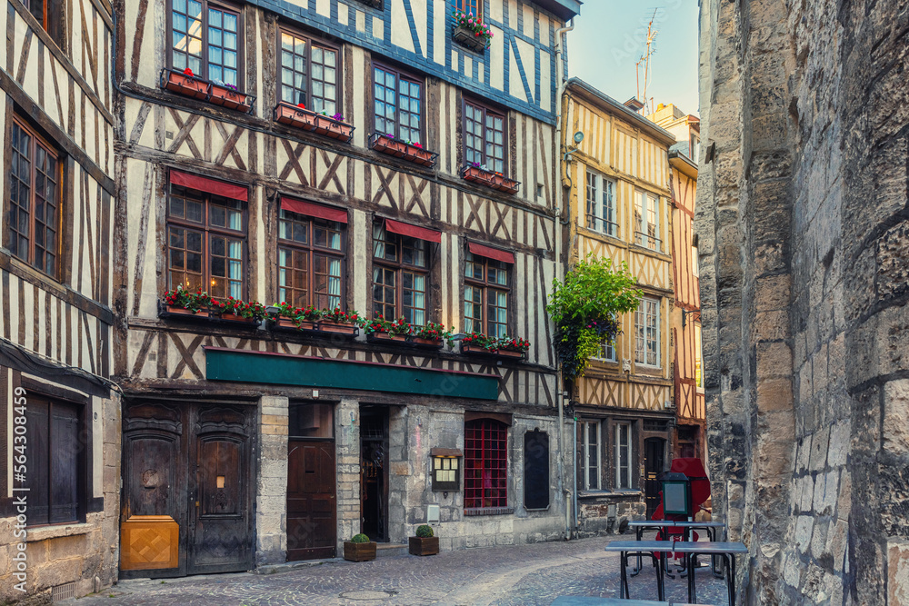 Old cozy street with timber framing houses in Rouen, Normandy, France. Architecture and landmarks of Rouen