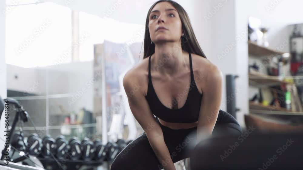 woman is training with kettlebell woman is training with kettlebell