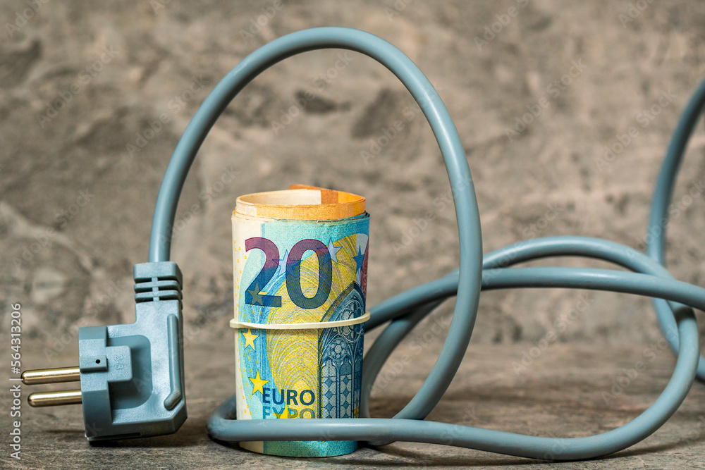 Naklejka premium Electric plug and roll of euro banknotes
