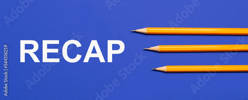 Photo of three orange pencils on a blue background with the text RECAP