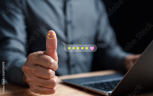 Businessman with thumb up Positive emotion happy five star and heart icon, Customer satisfaction feedback review concept. Customer service experience and business satisfaction...