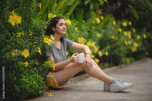 Relaxed young female smilin...