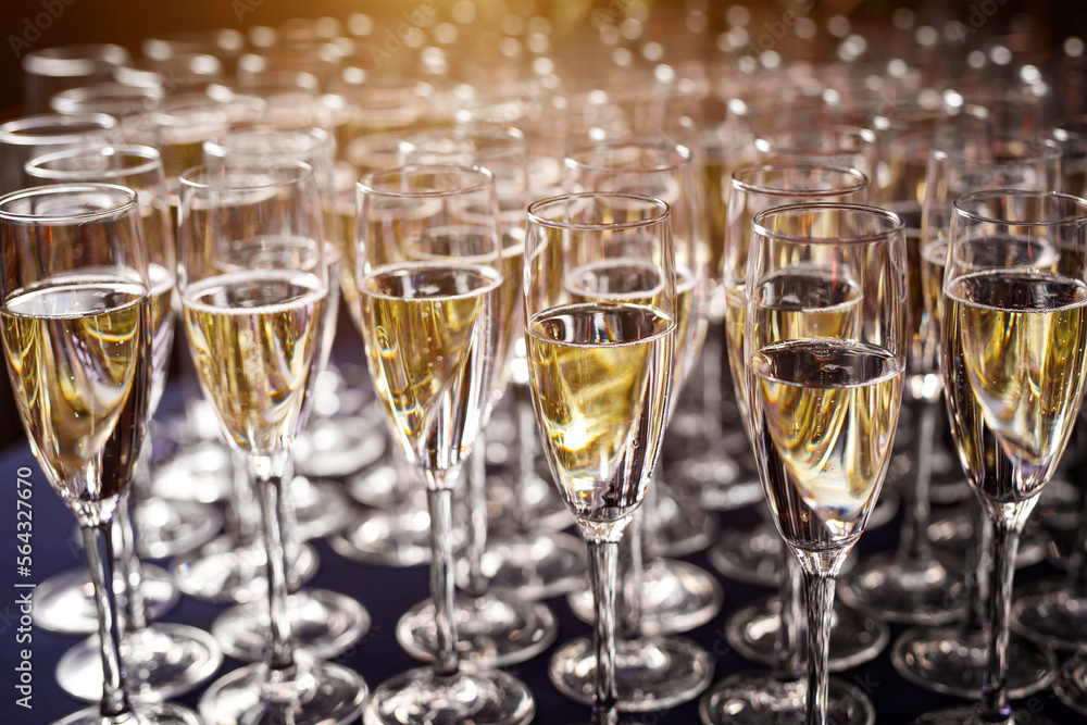 The row of champagne glasses at the party. The row of champagne glasses at the party.