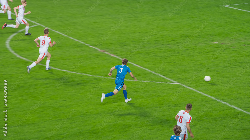 Obraz premium Stadium Soccer Football Match Championship: White Team Attacks and Plays in Pass, Dribble. Action Game on a International Tournament. Live Sport Broadcast Channel Television Concept.