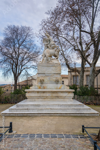 Vertical view of the ancient white marble fountain of the unicorns or fontaine des licornes monument on Canourgue square, Montpellier, France