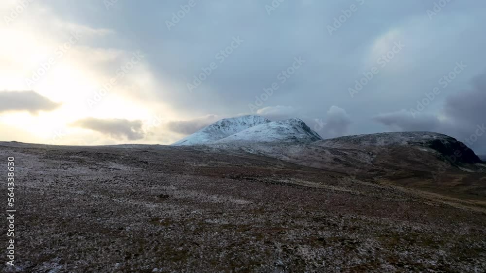 The snow covered Mount Errigal, the highest mountain in Donegal - Ireland. The snow covered Mount Errigal, the highest mountain in Donegal - Ireland.