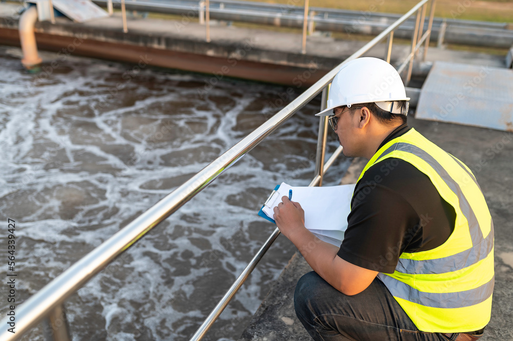 Environmental engineers work at wastewater treatment plants,Water supply engineering working at Water recycling plant for reuse Environmental engineers work at wastewater treatment plants,Water supply engineering working at Water recycling plant for reuse