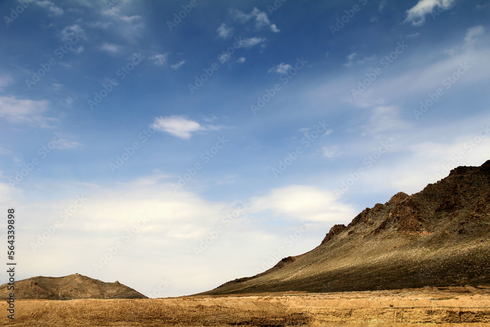 Afghanistan landscape, desert plain against the backdrop of mountains