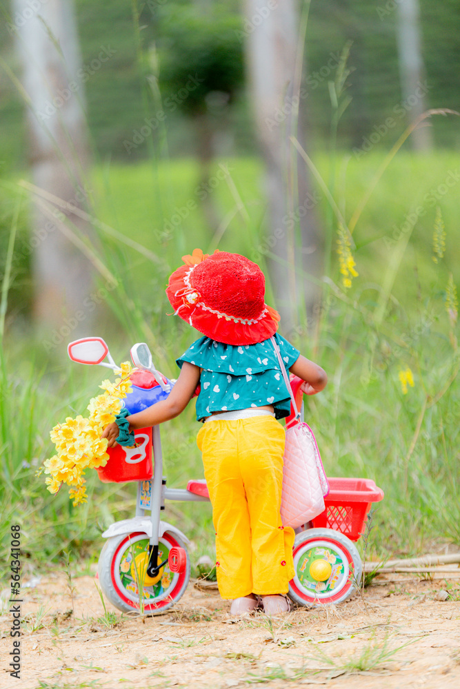 beautiful baby girl with a bicycle beautiful baby girl with a bicycle
